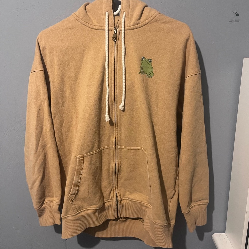 American Eagle Outfitters Tan Zip-Up Hoodie with Green Frog Patch